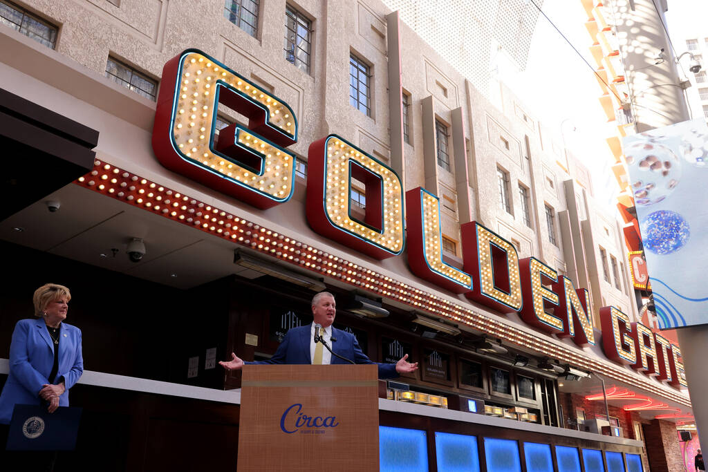 Golden Gate CEO Derek Stevens speaks as Las Vegas Mayor Carolyn Goodman and looks on during a c ...