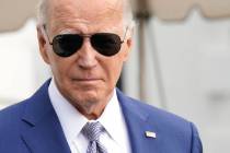 President Joe Biden walks to speak to the media before boarding Marine One on the South Lawn of ...