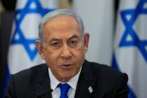 Israeli Prime Minister Benjamin Netanyahu chairs a cabinet meeting at the Kirya military base, ...