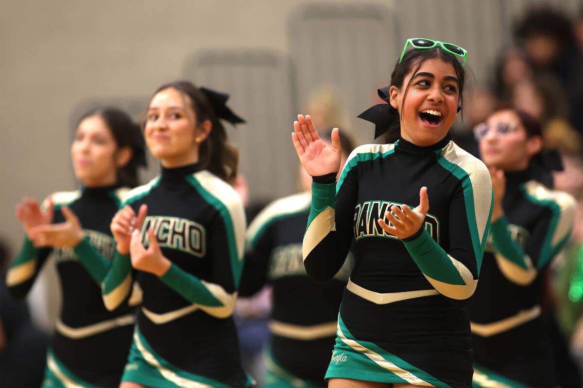 Rancho cheerleaders perform during the first half of a high school basketball game against Cany ...
