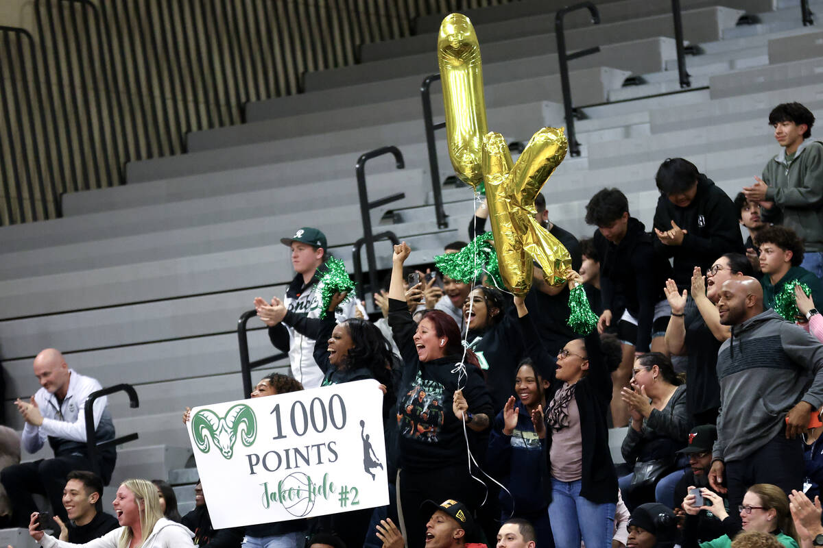 Rancho fans cheer for guard Jakoi Lide after he scored his thousandth point during the second h ...