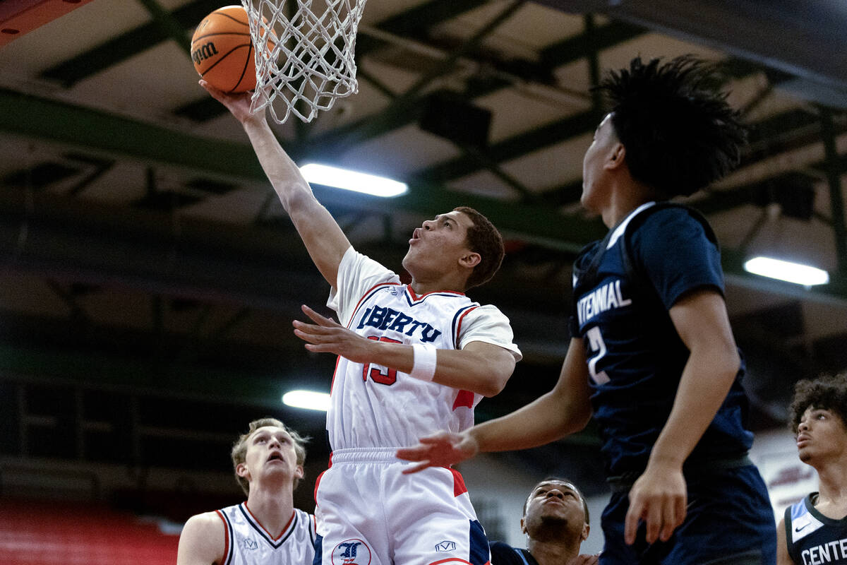 Liberty forward Dante Steward (15) shoots against Centennial guard Aiden Cueto (2) during the f ...