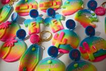 The neon desert sky lineup of earrings and keychains designed by the Las Vegas based Love, Hand ...