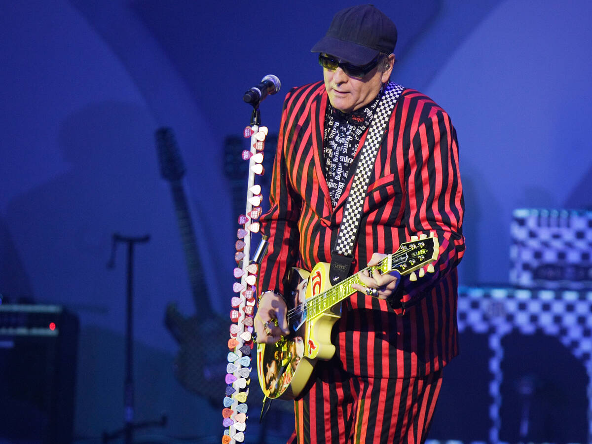 Cheap Trick guitarist Rick Nielsen performs with fellow members of his band, during their "Sgt ...