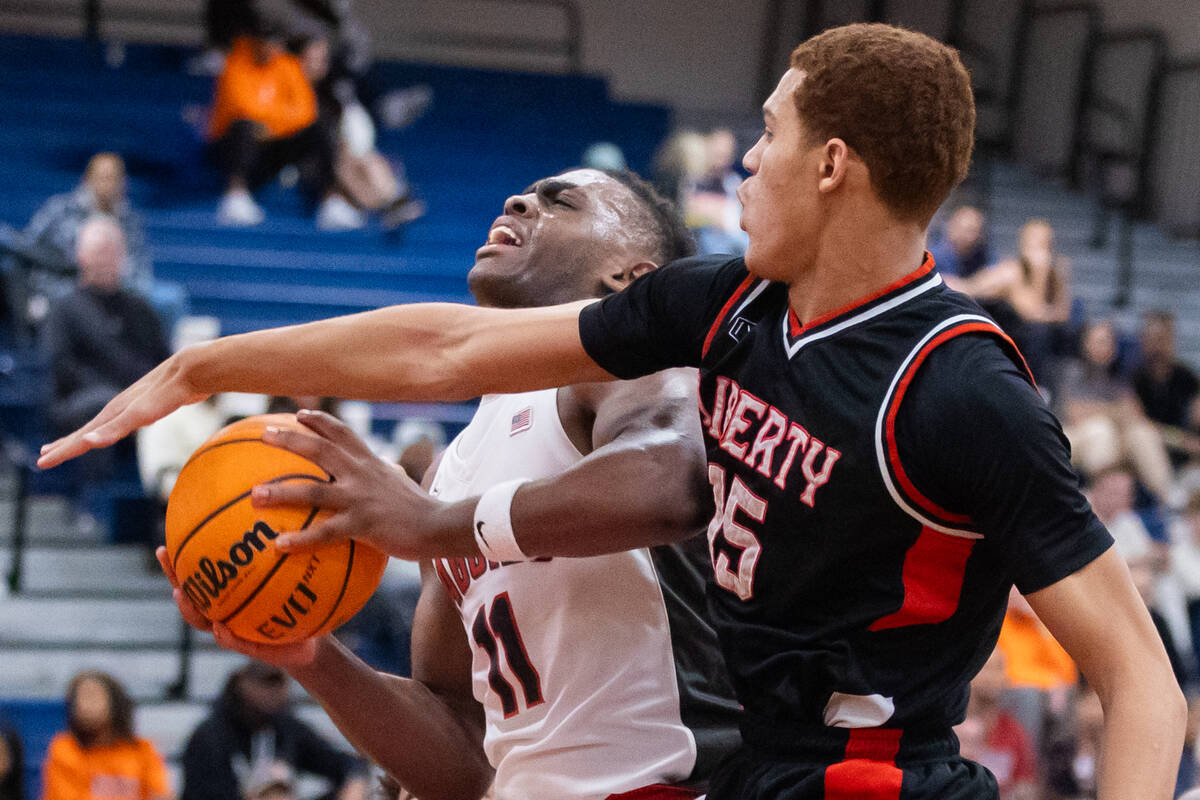 Liberty’s Tyler Bright (25) blocks Arbor View’s Brian “Chef” Townse ...