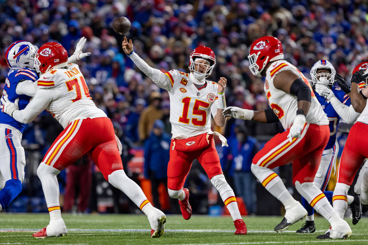 Kansas City Chiefs quarterback Patrick Mahomes (15) throws a pass during an NFL divisional roun ...