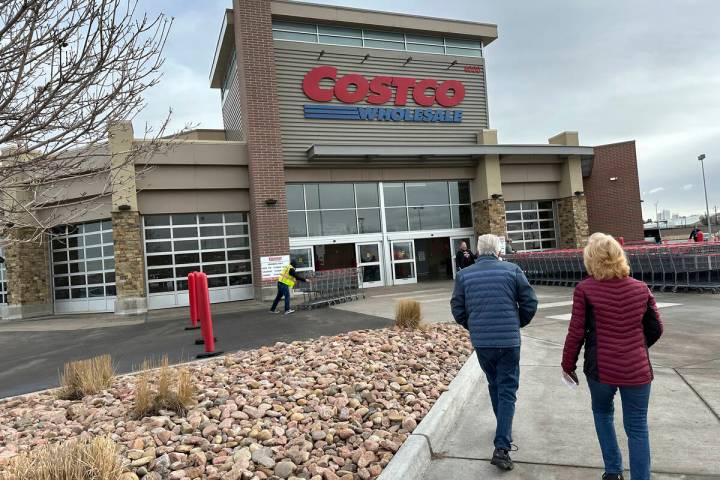 Shoppers head into a Costco warehouse Thursday, Jan. 11, 2024, in Sheridan, Colo. (AP Photo/Dav ...