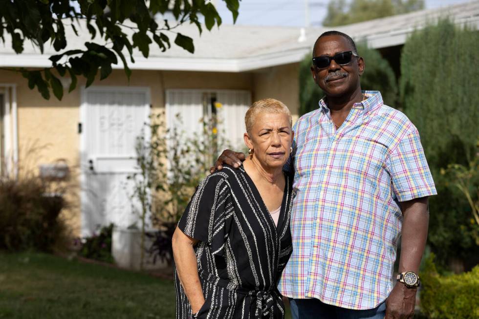 Robert Lee and his wife, Veronica Gisendaner, outside their house on Friday, Oct. 13, 2023, in ...