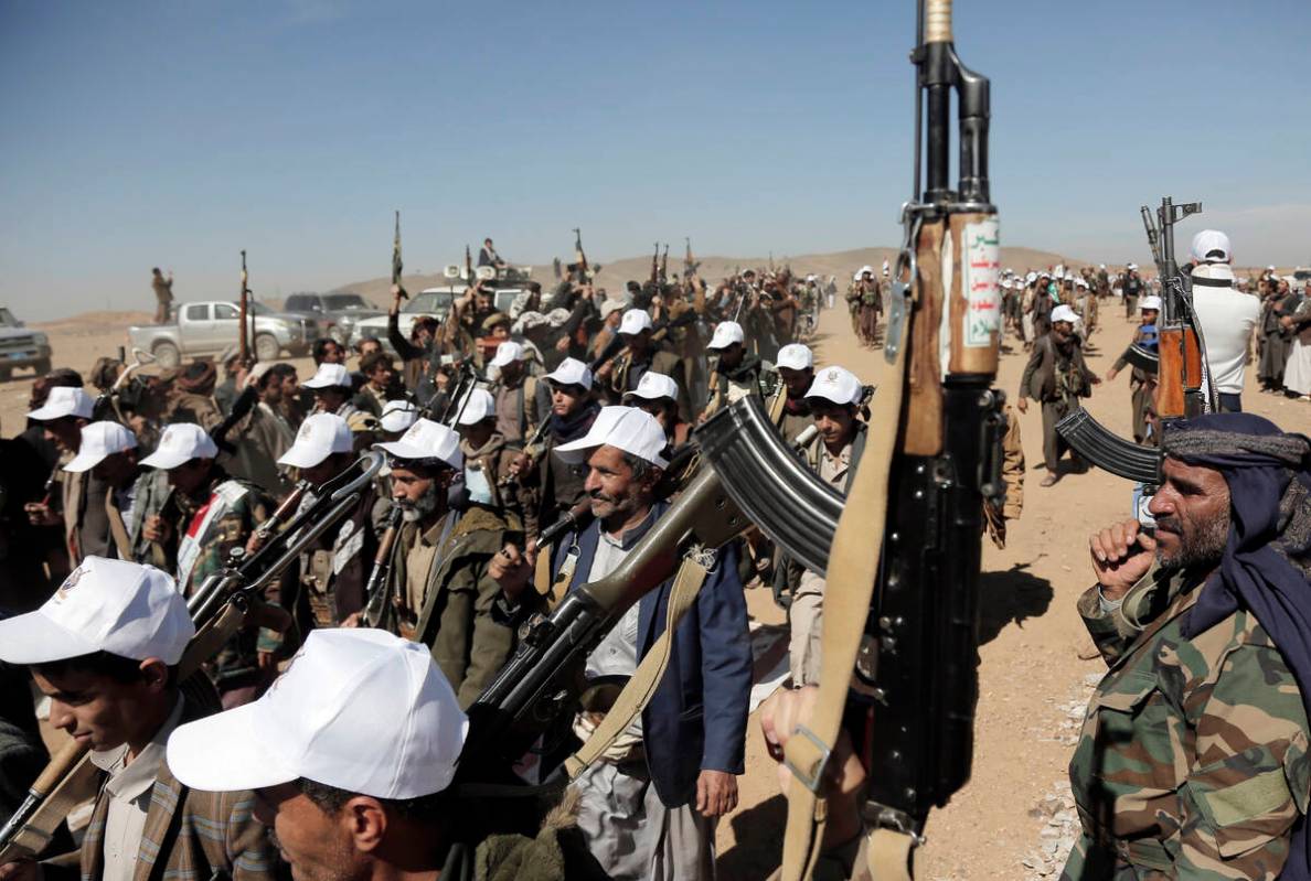 Houthi fighters march during a rally of support for the Palestinians in the Gaza Strip and agai ...