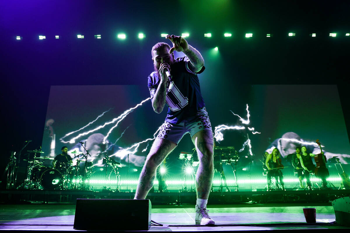 Post Malone performs onstage as Fontainebleau Las Vegas rings in 2024 at Fontainebleau Las Vega ...