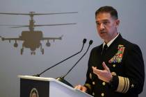 U.S. Navy Vice Adm. Brad Cooper, who heads the Navy's Bahrain-based 5th Fleet, speaks at an eve ...
