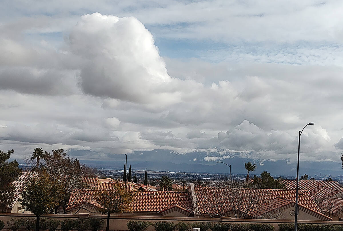 Some spots of blue sky emerge over the Las Vegas Valley shortly before noon Tuesday, Jan. 23, 2 ...