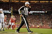 Referee Bill Vinovich blows a whistle during an NFL football game, Monday, Dec. 25, 2023, in Sa ...