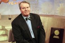 FILE - Charles Osgood, anchor of CBS's "Sunday Morning," poses for a portrait on the ...