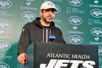 New York Jets quarterback Aaron Rodgers speaks to reporters at the team's NFL football facility ...