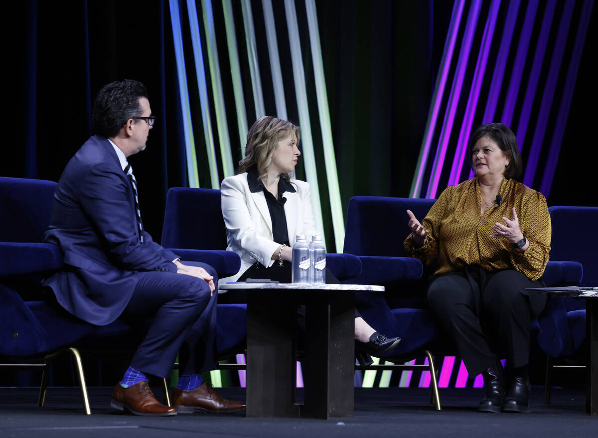 Betsy Fretwell, right, COO, Las Vegas Grand Prix, Inc., speaks as Renee Wilm, center, CEO of th ...