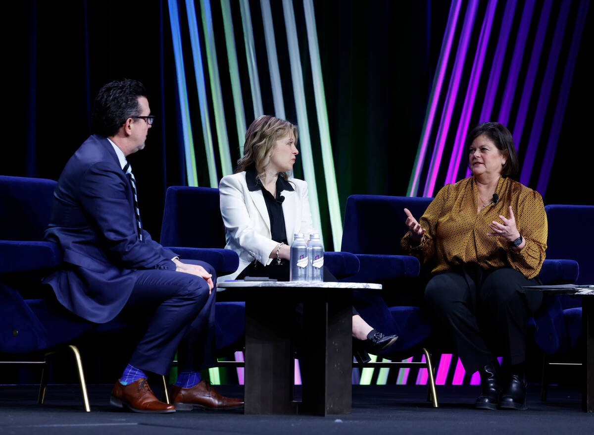 Betsy Fretwell, right, COO, Las Vegas Grand Prix, Inc., speaks as Renee Wilm, center, CEO of th ...