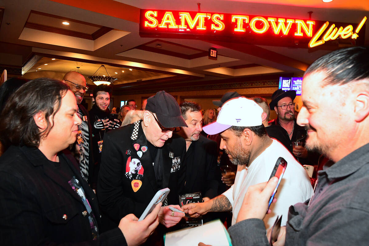 Rock legend Rick Nielsen of Cheap Trick is shown with fans at the “Vegas Rocks! Magazine Musi ...