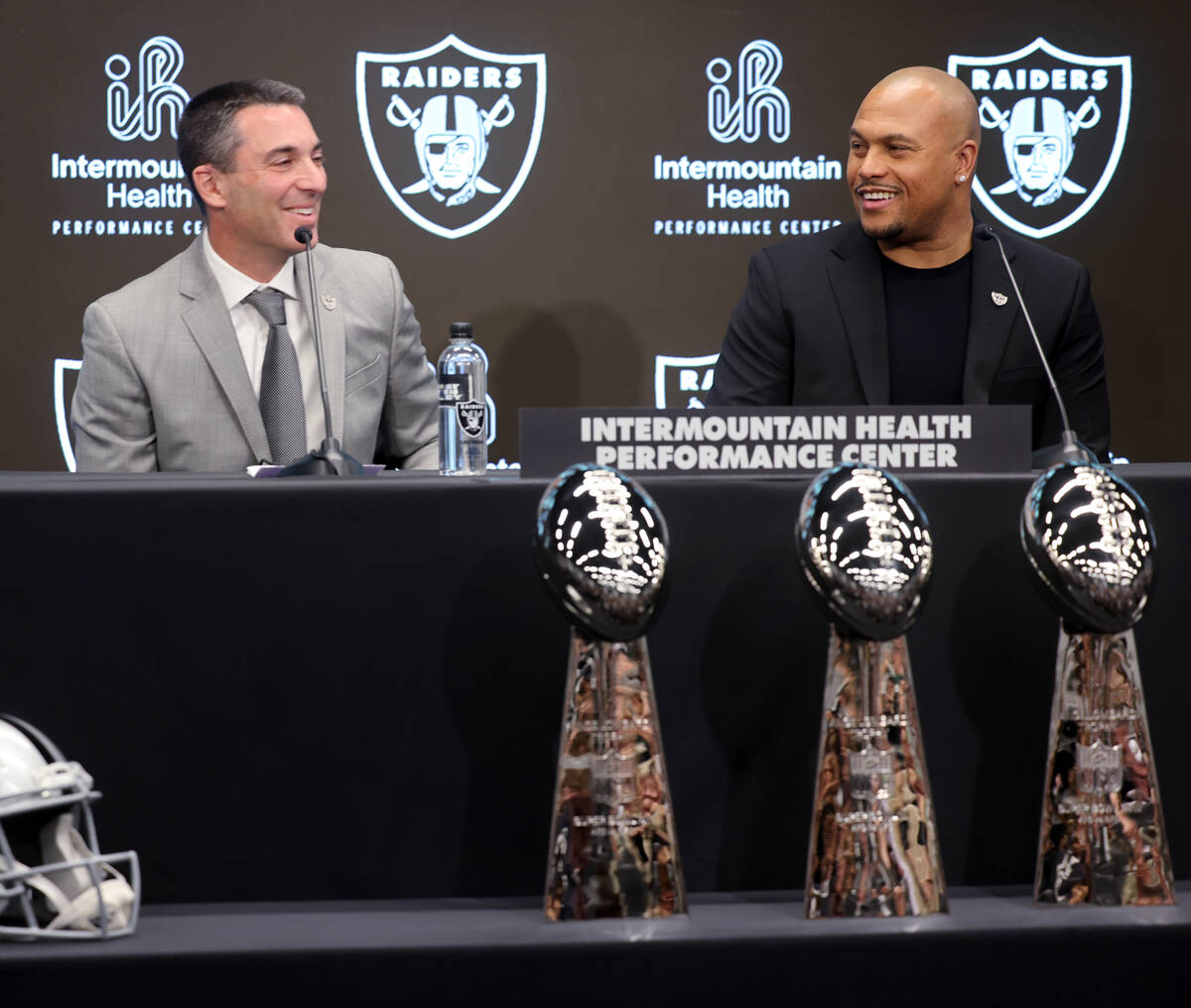Tom Telesco, left, and Antonio Pierce are introduced as general manager and coach during a pres ...
