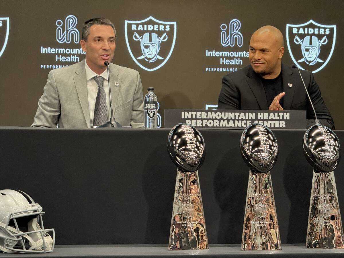 The Raiders introduced new general manager Tom Telesco, left, and coach Antonio Pierce in a new ...
