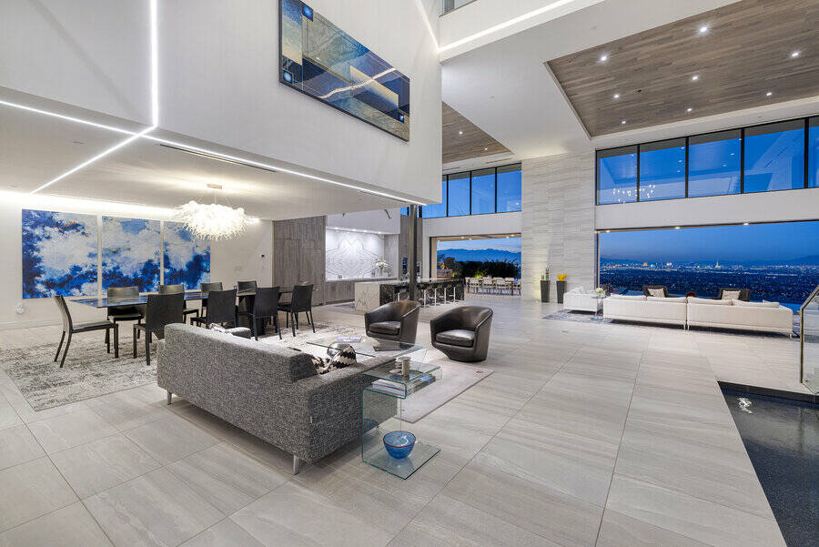 The over 10,000-square-foot residence has a massive living area. (Photo courtesy of Natalia Har ...