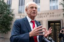 Former Trump White House official Peter Navarro talks to the media as he arrives at U.S. Federa ...