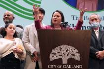 Oakland Mayor Sheng Thao delivers a speech onstage with her family at the Paramount Theatre dur ...