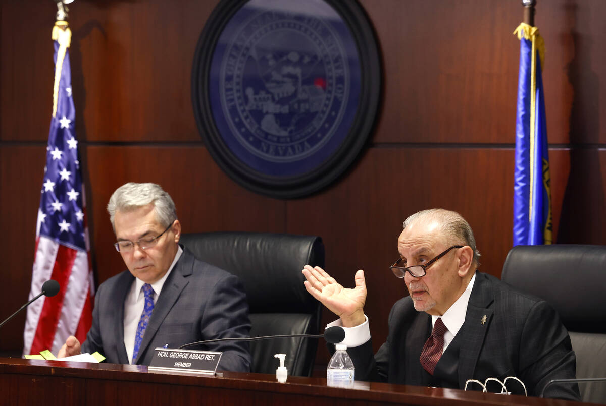 The Nevada Control Board Chairman Kirk Hendrick, left, listens to Gaming Control Board member G ...
