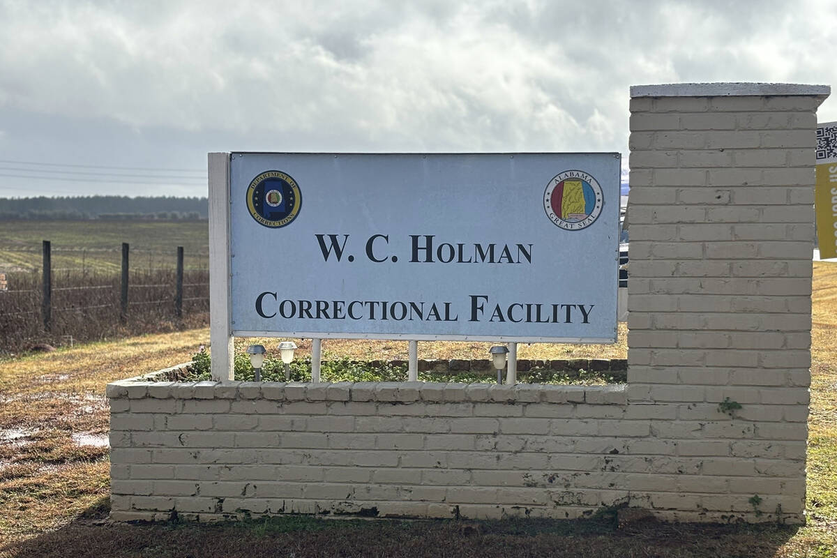 A sign for Holman Correctional Facility in Atmore, Ala., is shown on Thursday, Jan. 25, 2024. ...