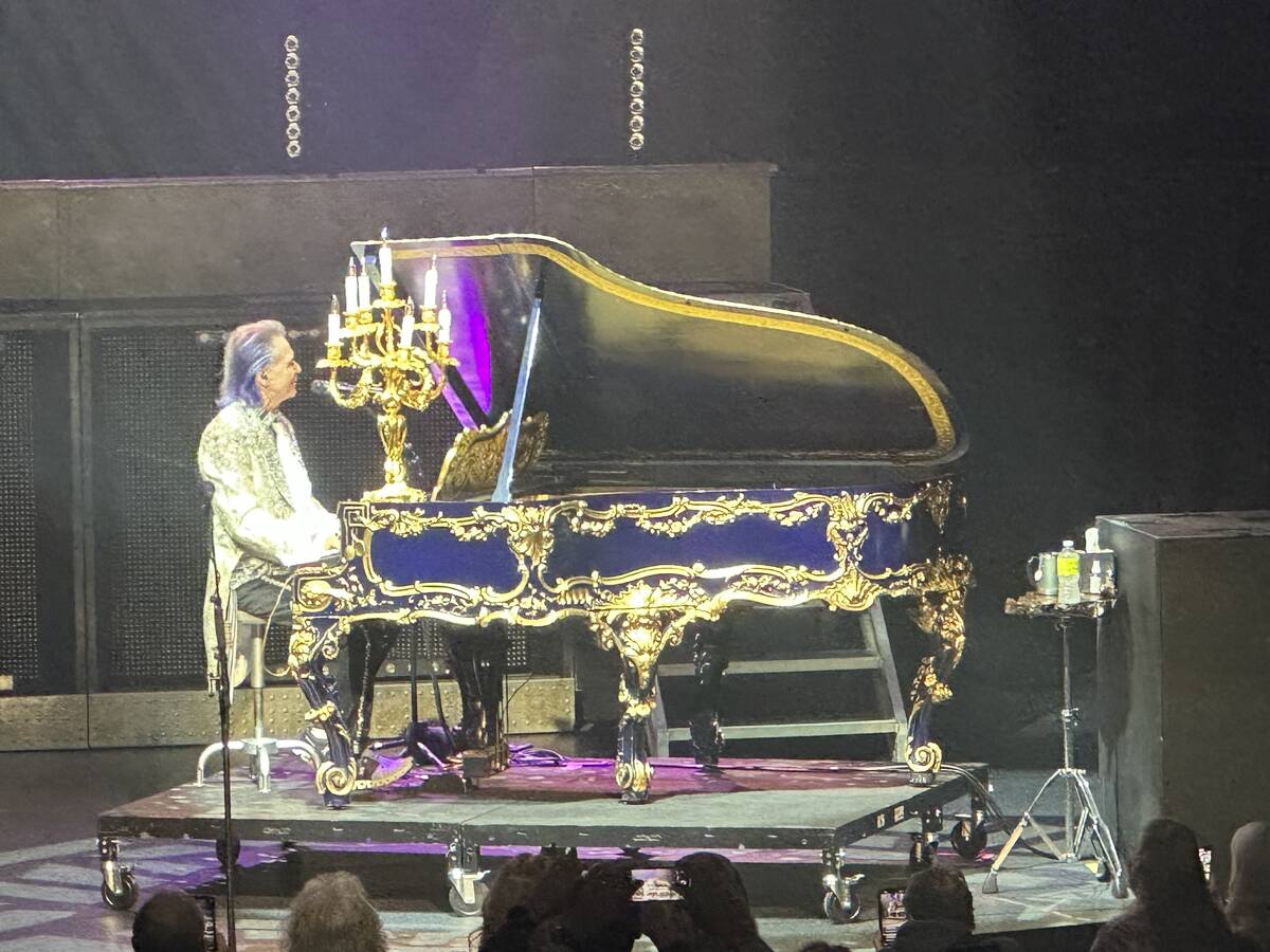 Lawrence Gowan of Styx is shown with Liberace's "Dancing Waters" Liberace Steinway at The Venet ...