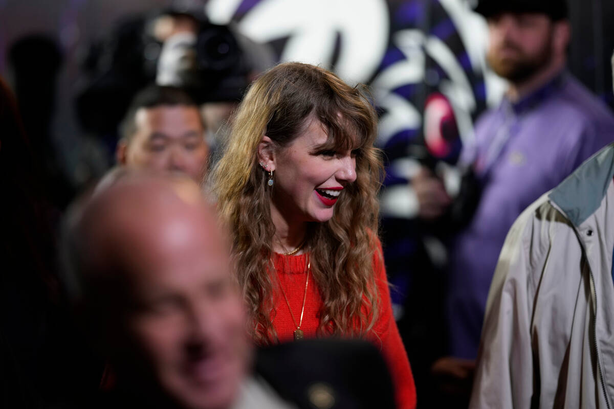 Taylor Swift smiles after the AFC Championship NFL football game, Sunday, Jan. 28, 2024, in Bal ...
