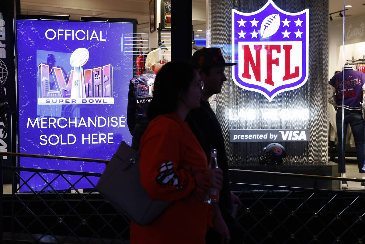 Shoppers walk past the NFL Las Vegas store at the Forum Shops, on Tuesday, Jan. 30, 2024, in La ...