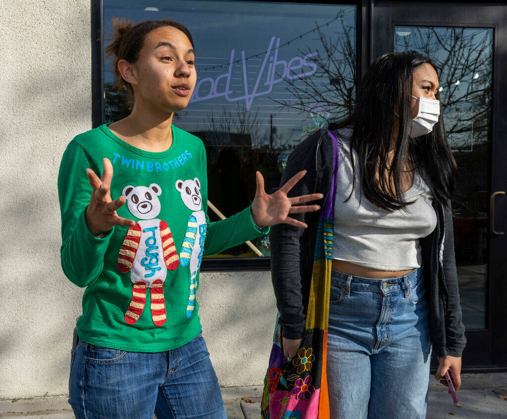 Nevada voters Kya Johnson, left, and Megan Yamat talk about the two nominating processes, the c ...