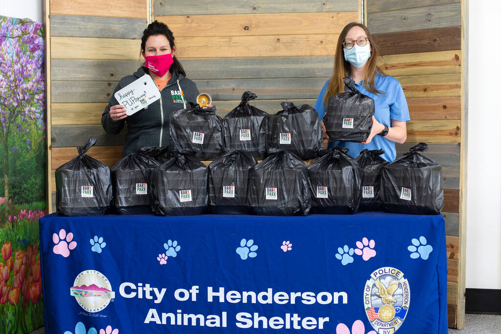 Jen Freet, owner of Barx Parx, left, and Kianna Dombrowski, kennel attendant at City of Henders ...