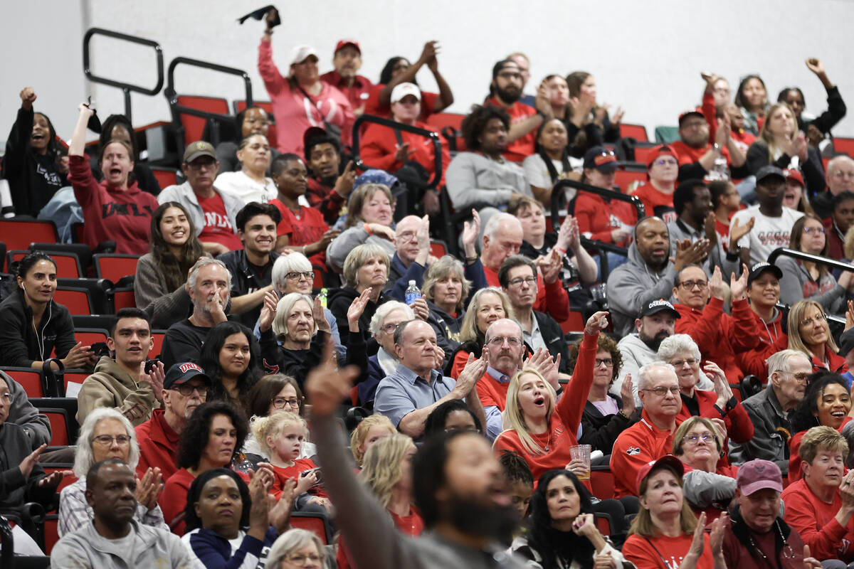 UNLV Lady Rebels fans cheer for their team during the second half of an NCAA college basketball ...