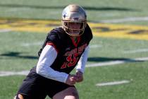 National edge Laiatu Latu of Ucla runs through drills during practice for the Senior Bowl NCAA ...