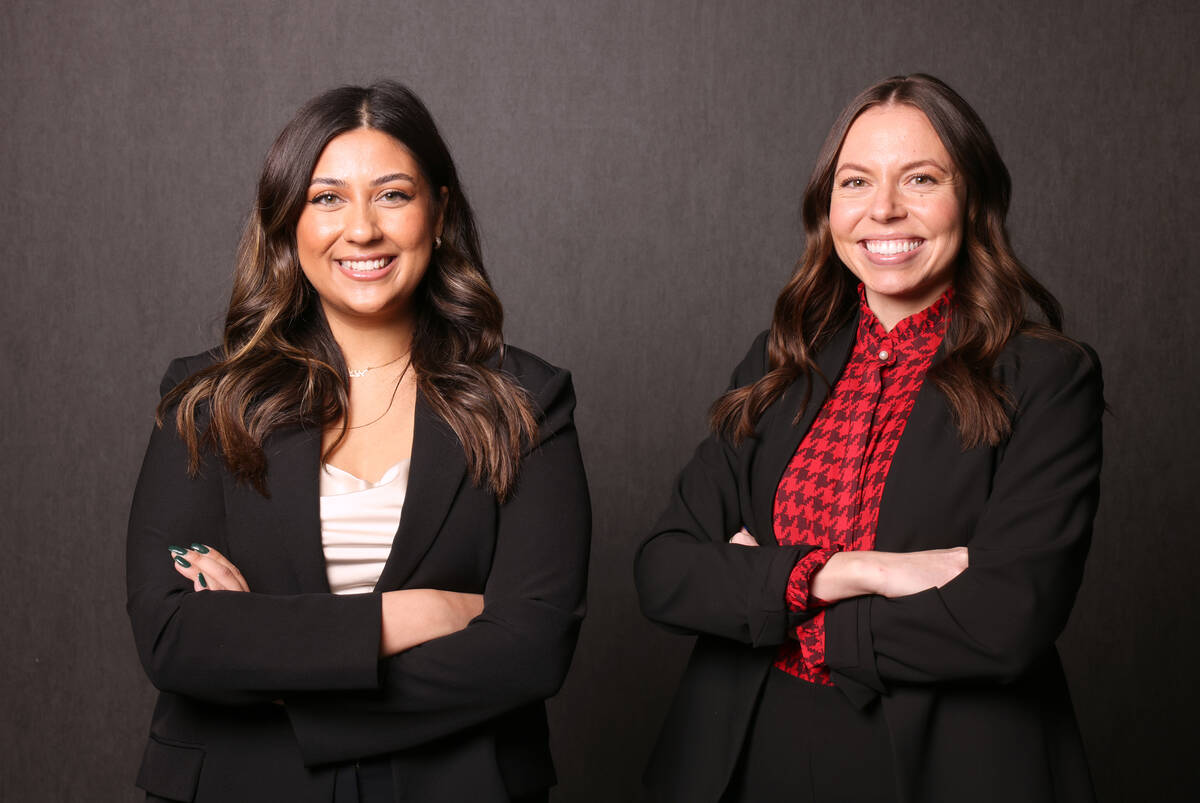 Commercial real estate brokers Areeba Moten, left, and Megan McInerney, pose at Colliers Intern ...