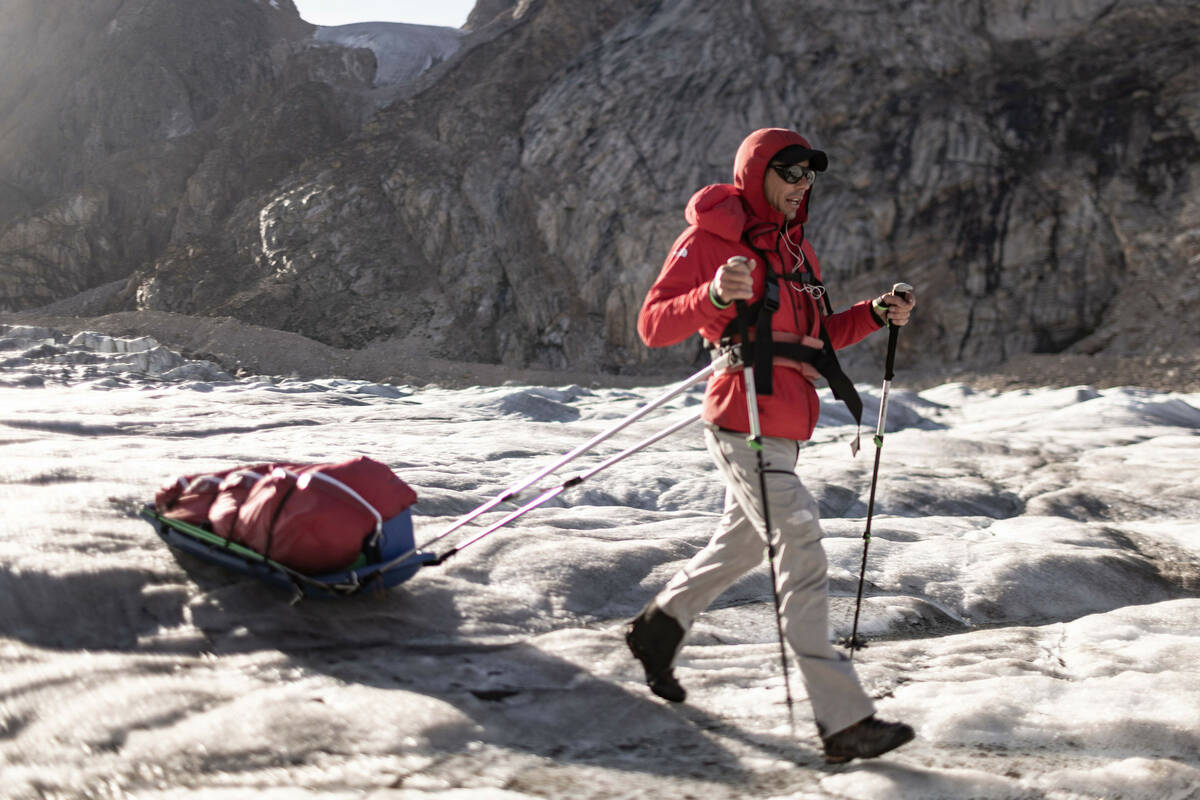Alex Honnold traverses a stretch of dry glacier in Eastern Greenland. (photo credit: National ...