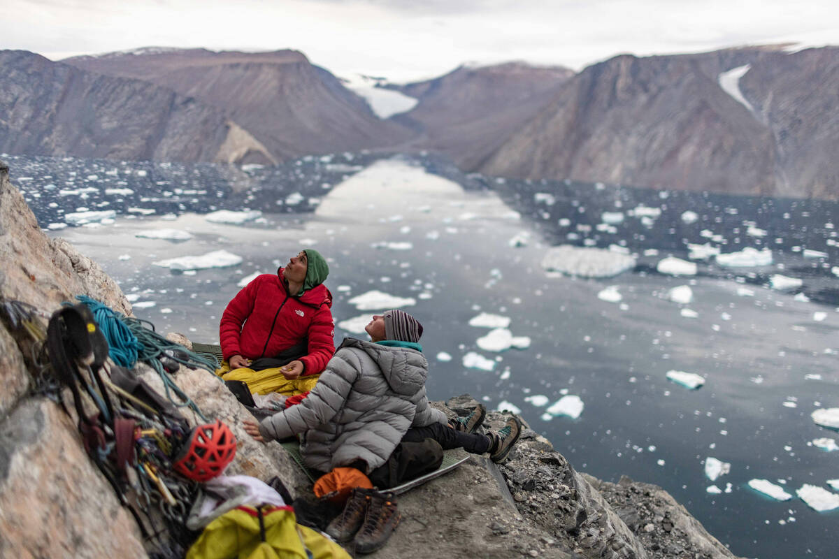 Alex Honnold, left, and Hazel Findlay on shiver bivy. (photo credit: National Geographic/Pablo ...