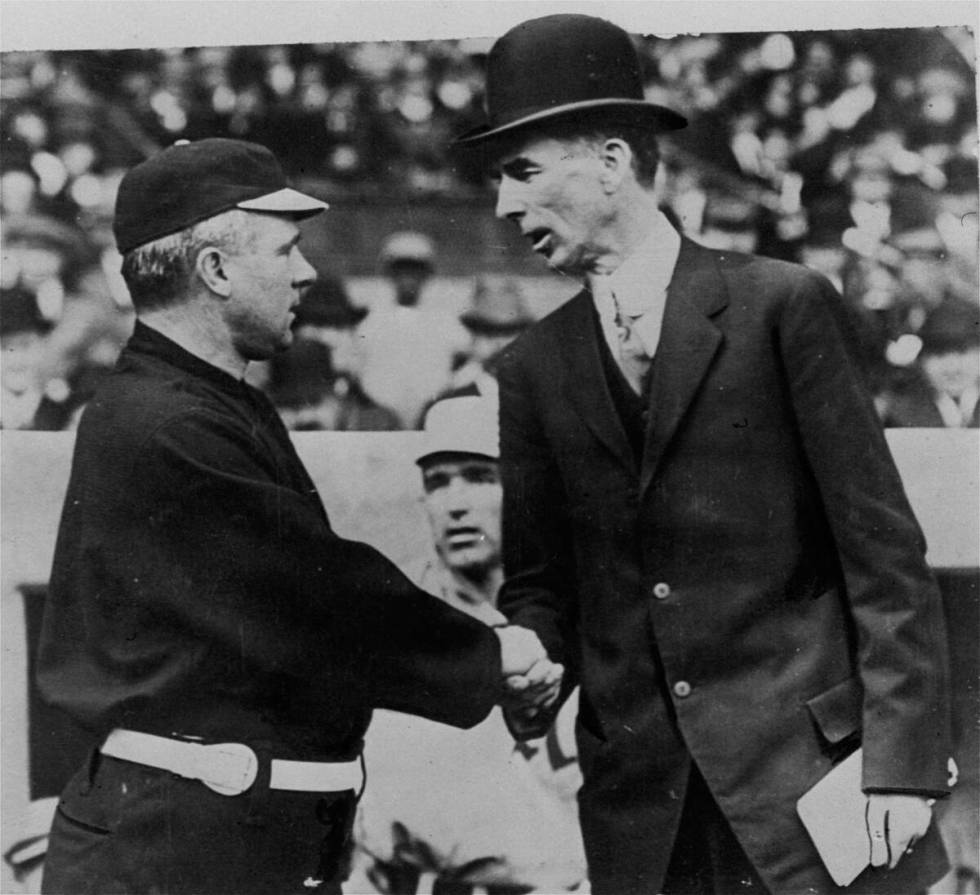 FILE - In this Oct. 14, 1911, file photo, Philadelphia Athletics' Connie Mack, right, and New ...