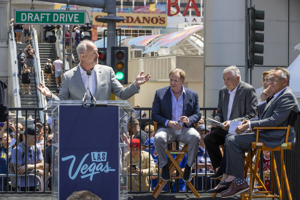 From left, LVCVA President and CEO Steve Hill speaks while joined by NFL Commissioner Roger Goo ...