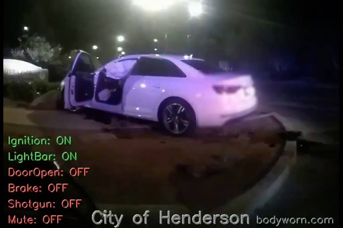 A screen grab of police body camera footage showing officer Katherine Cochran's white Audi, whi ...