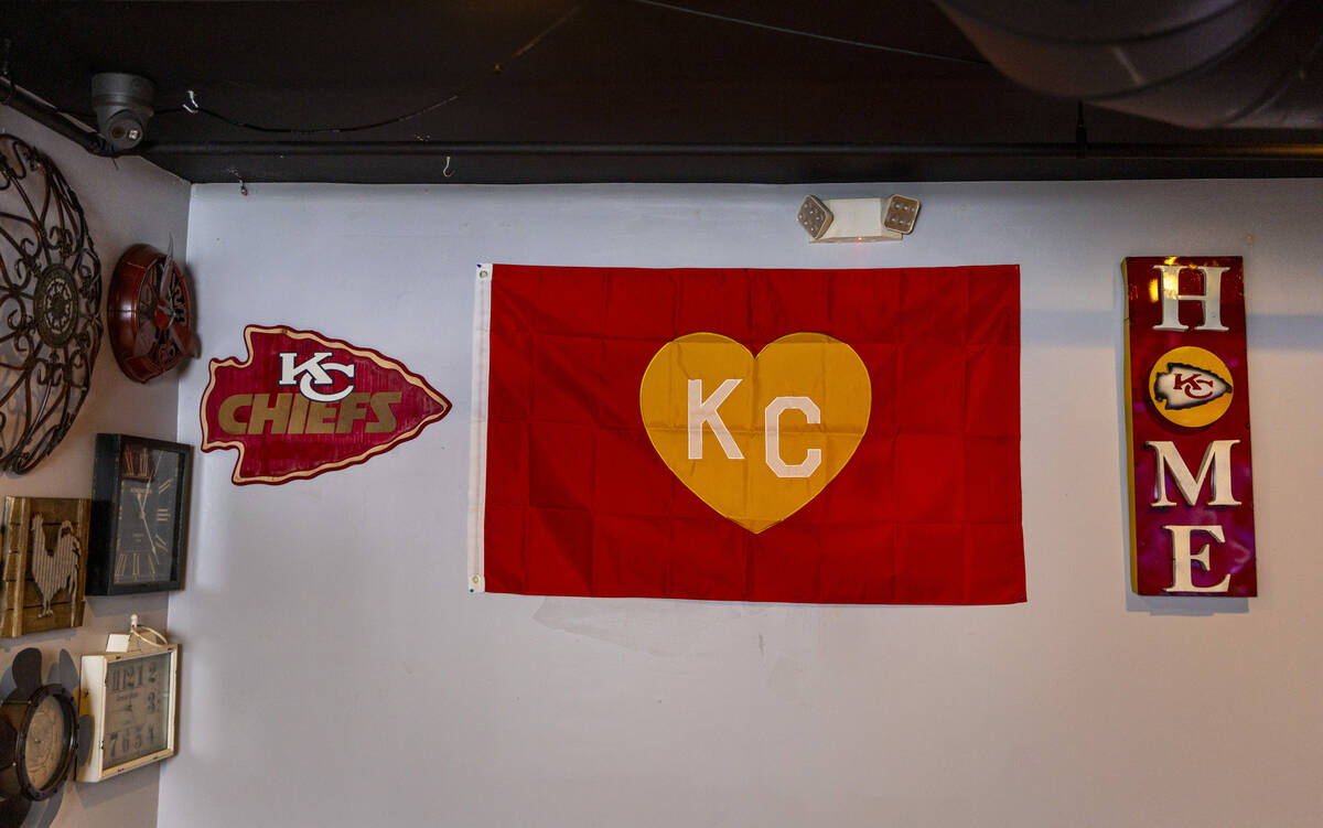 Memorabilia on the wall in the Jackpot Bar, a Kansas City Chiefs bar which features members of ...