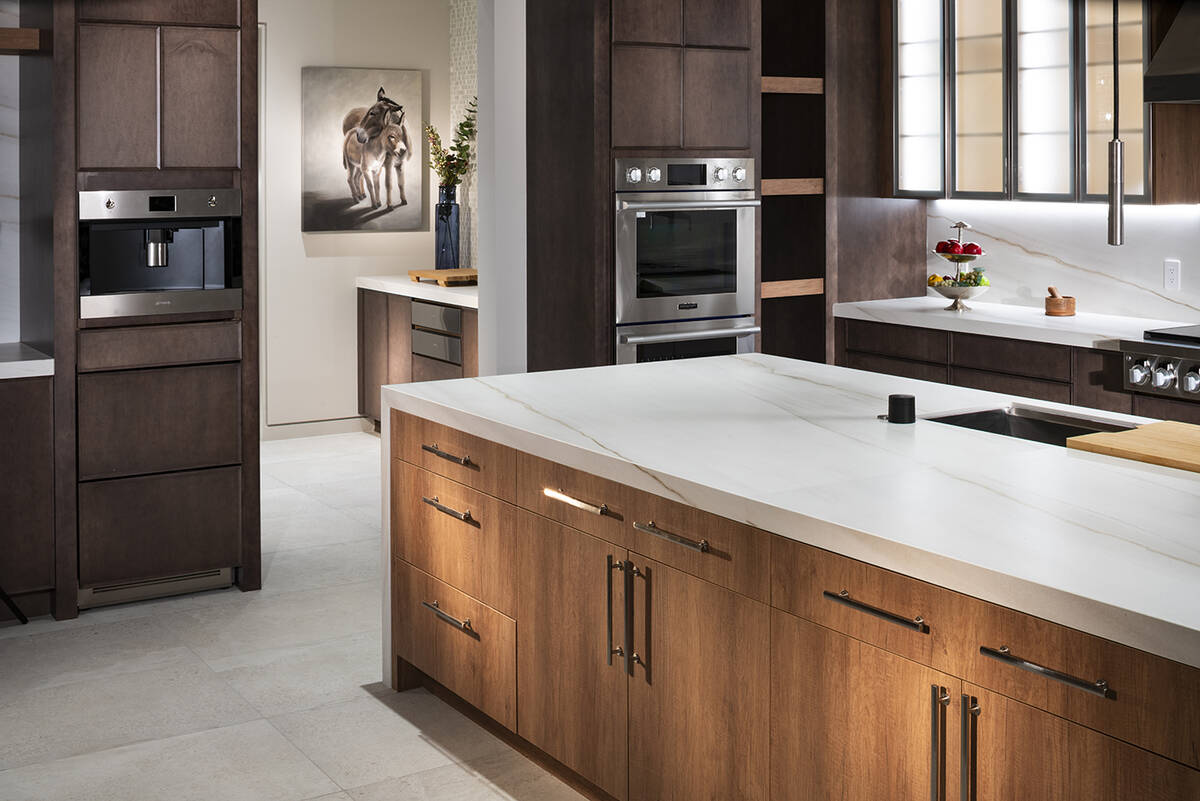 The kitchen showcases high-tech features. (Levi Ellyson/501 Studios, courtesy Pro Builder Media)