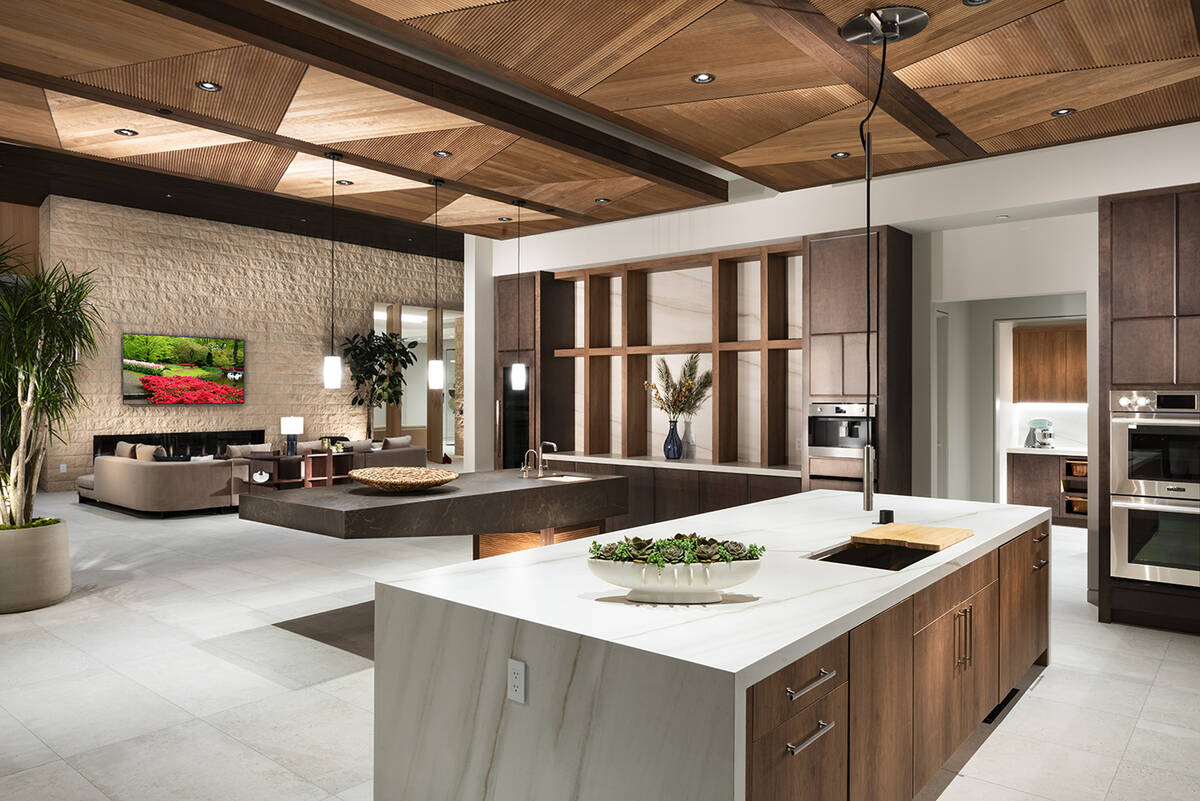 The voluminous open-concept floor plan seamlessly integrates formal living, dining, gourmet kit ...