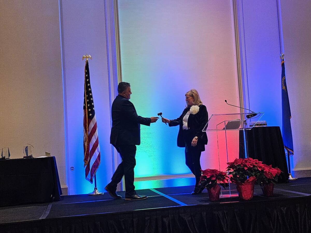 2024 SNHBA President Carlos Zuluaga accepted a ceremonial gavel from outgoing president Nicole ...