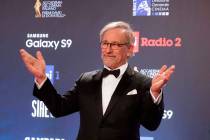 FILE - In this March 21, 2018 file photo, Steven Spielberg walks the red carpet as he arrives t ...
