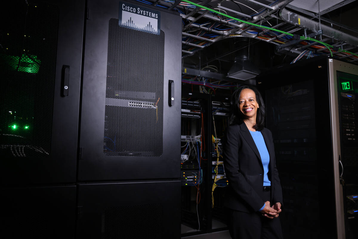 Janet Uthman, market vice president at Cox Communications, poses for a photo at Cox offices in ...