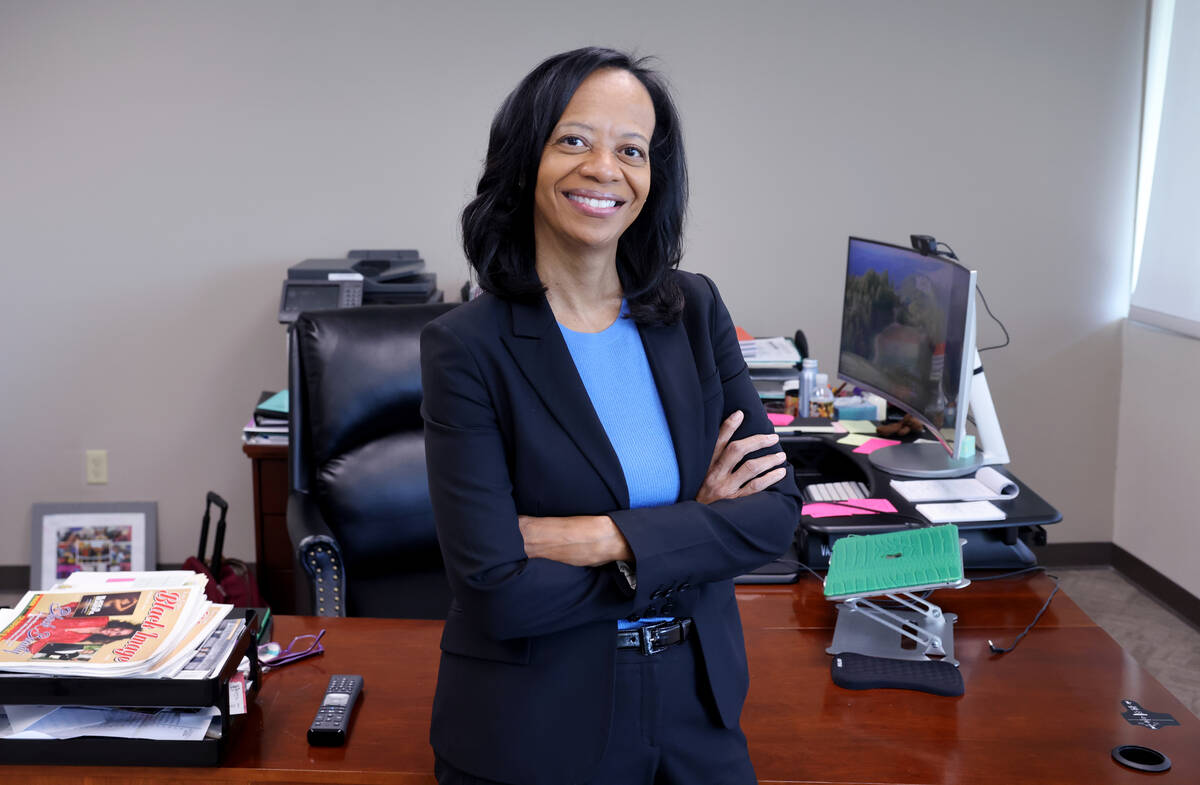 Janet Uthman, market vice president at Cox Communications, poses for a photo at Cox offices in ...