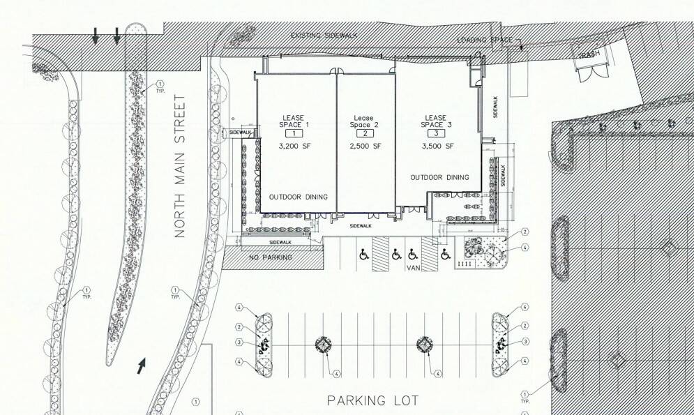 Site plans for a proposed 9,200 square foot restaurant building that could be added to Town Squ ...